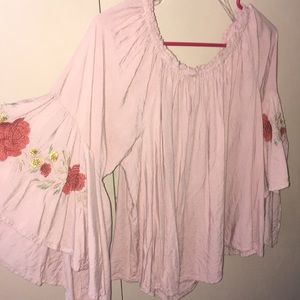 Pink shirt with floral pattern